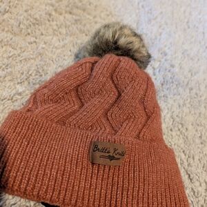 Britt's Knits Women's Rust Cable Knit Beanie with Faux Fur Pom